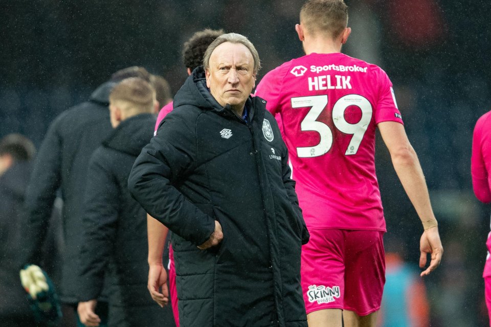 Neil Warnock's Huddersfield have been slapped with a transfer ban