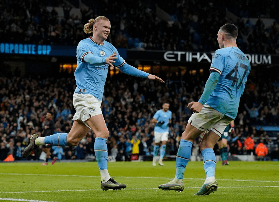 Rcord-breaking hitman Haaland celebrates opening the floodgates against Burnley with Man City's opener on 32 minutes