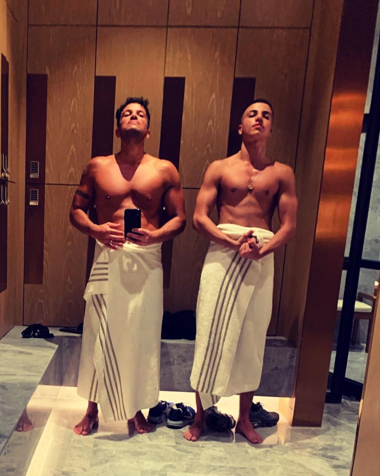 The pop star - all covered up in a sauna - is now a dad of four