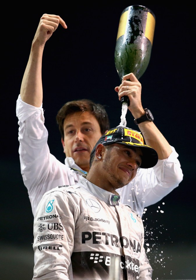 Mercedes team principal Toto Wolff celebrates with driver Lewis Hamilton