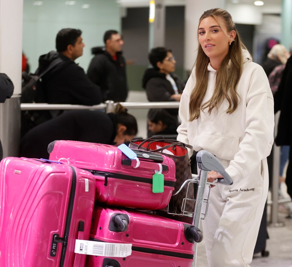 Rosie was dumped alongside Casey but seemed positive at the airport