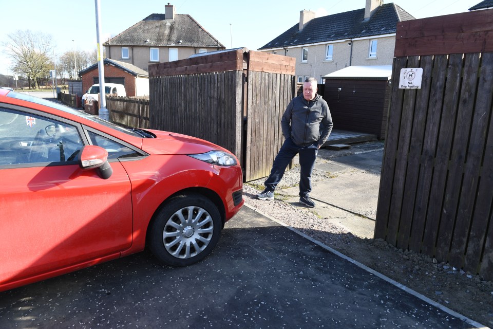 The dad slammed the council for building a foot-high kerb outside his house