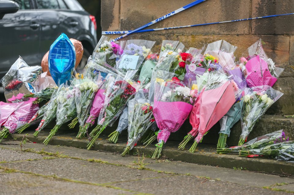 Flowers and other tributes left at the scene