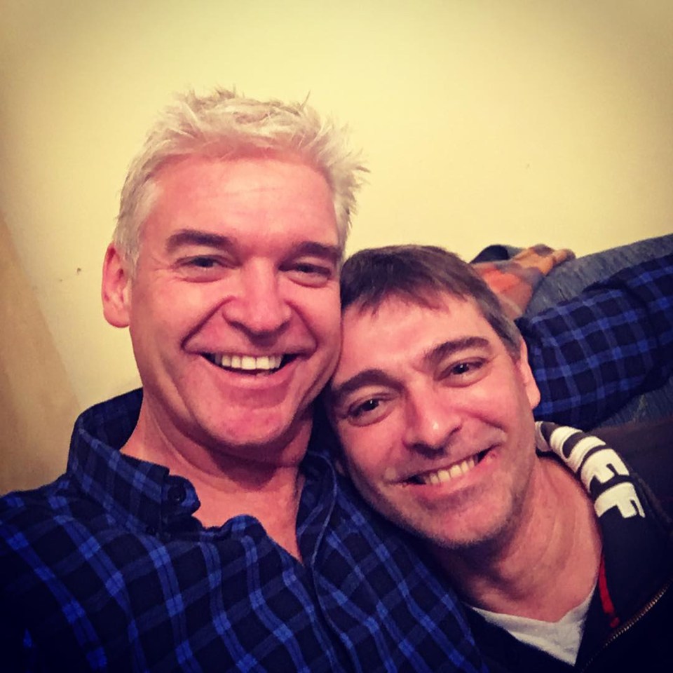 Phillip Schofield with his brother Tim who is alleged to have carried out the attacks while working for Avon and Somerset Police