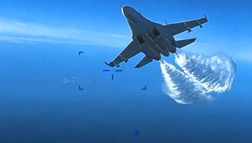 Footage shows the moment one of the Russian jets dumping fuel on a US drone