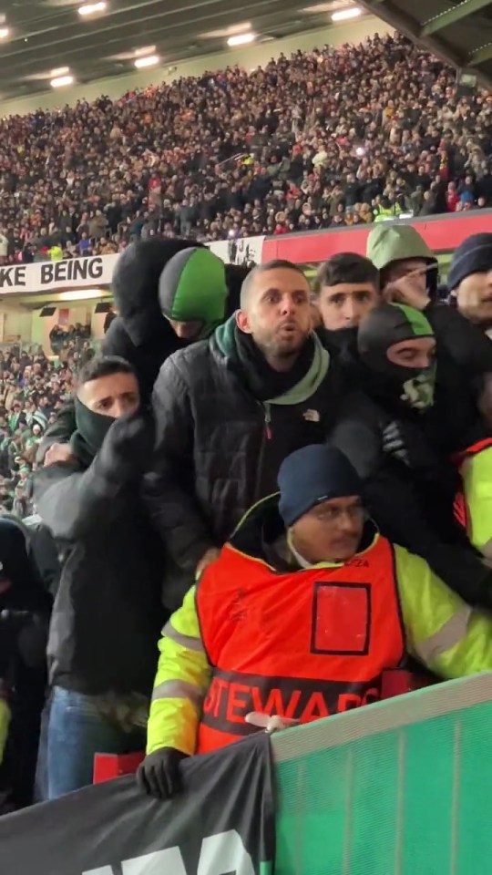 The disgraceful scenes saw stewards piled on in the stands