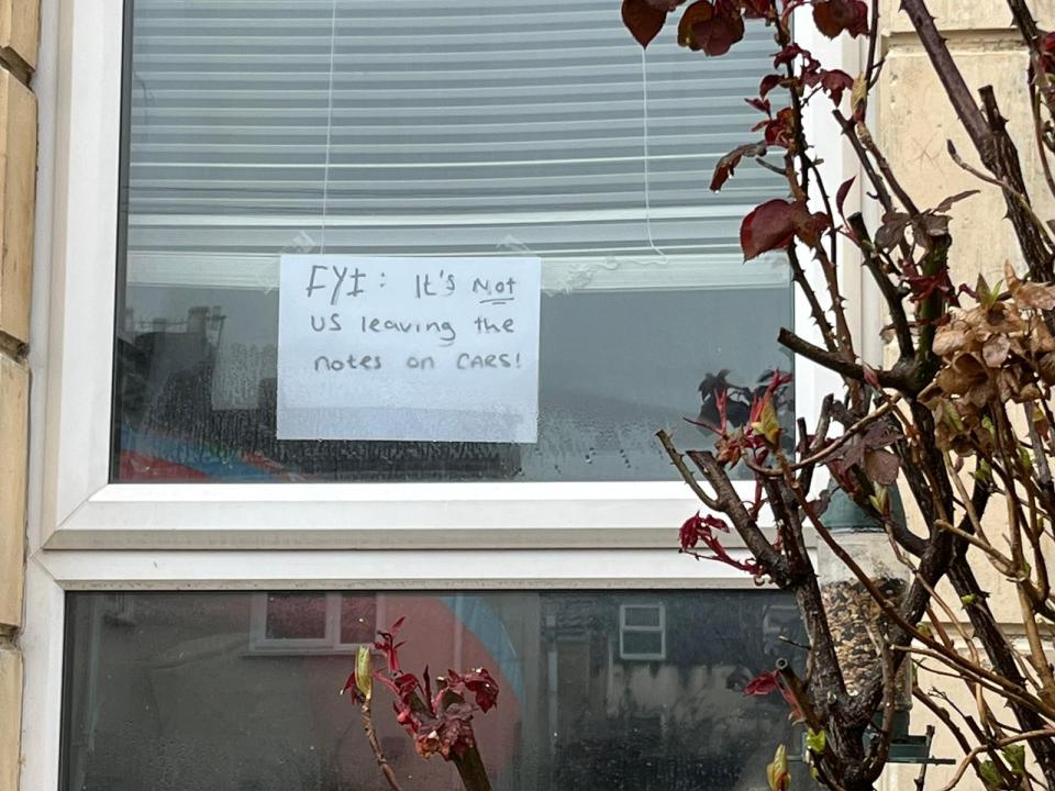 A resident of British Road posted their own sign indicating they were not responsible for signs on cars parked near their home