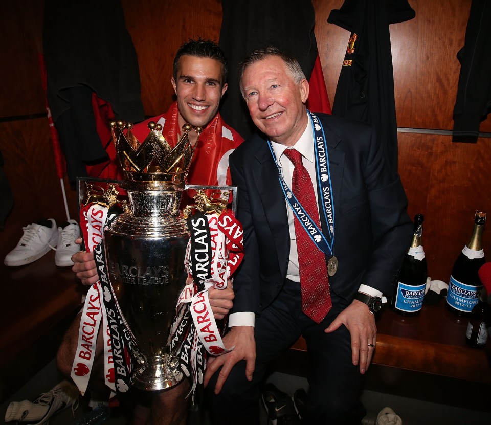 Robin Van Persie and Manager Sir Alex Ferguson celebrate after Manchester United win the Premier League in 2013