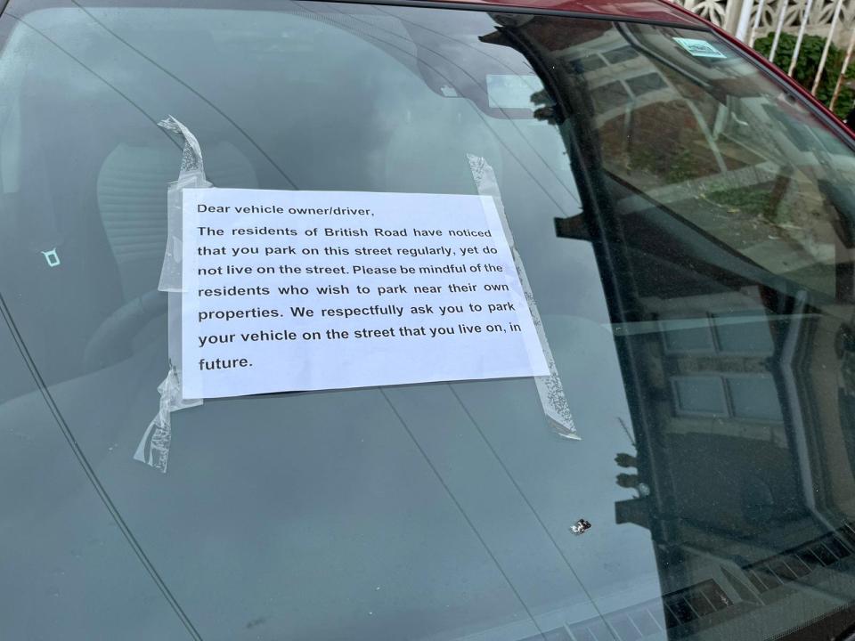 Signs on vehicles in British Road in The Chessels area of Bedminster calling for people from outside the area not to park there