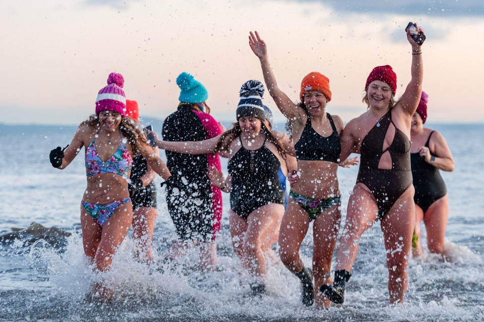 Sunrise swimmers take a dip in Edinburgh on International Women's Day despite freezing temperatures