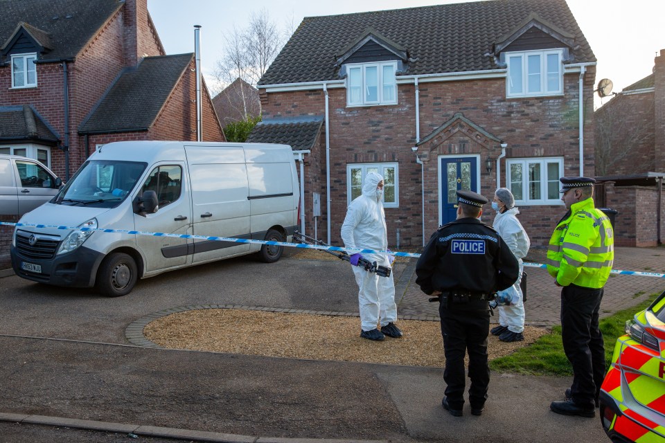 Cops outside Gary Dunmore's property on The Row, in Sutton, on Thursday