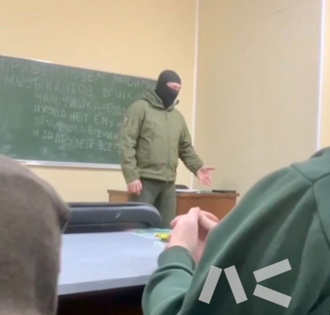 A picture of a Wagner mercenary at a Russian school, according to war correspondent Jason Jay Smart