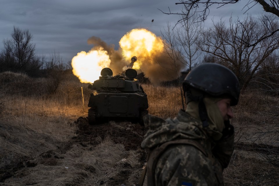 Ukrainian soldiers firing at the Russians