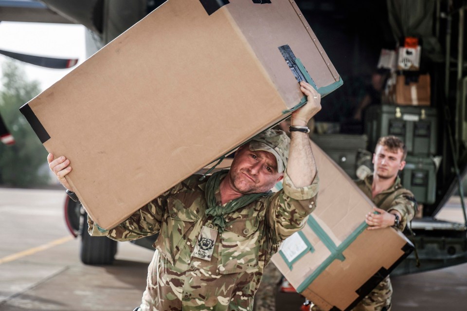 Troops bring in supplies for the evacuation