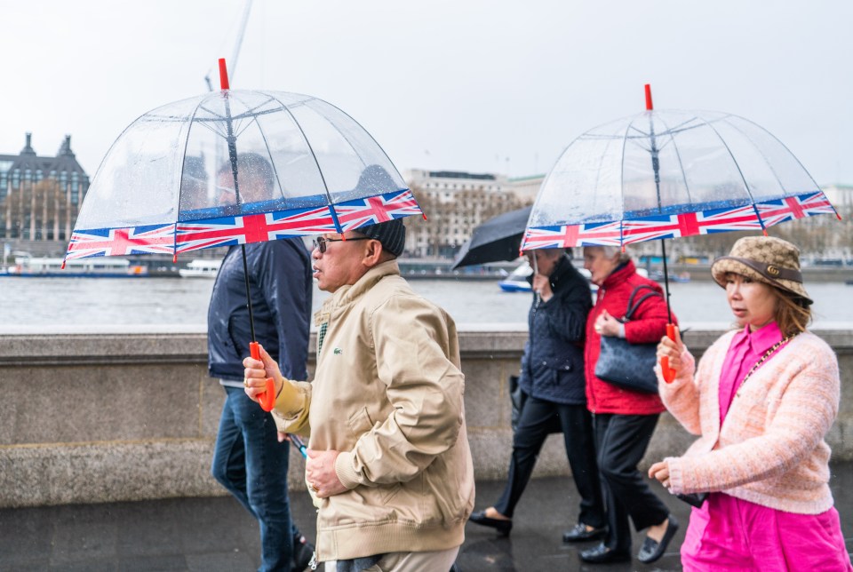 Damp conditions today, seen here in Westminster, London this morning, are expected to give way to sunshine over the weekend