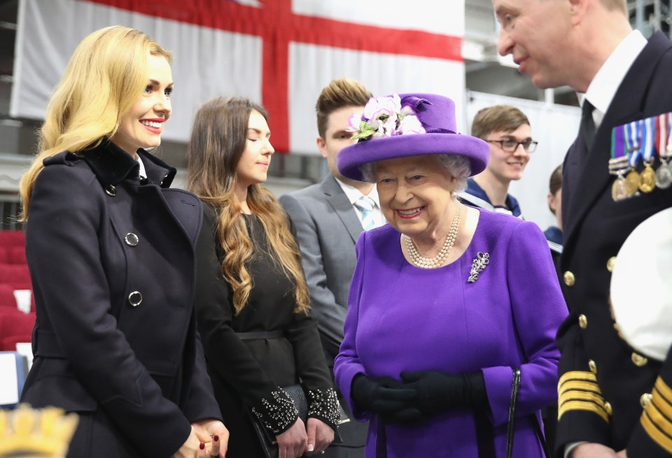 Katherine with the late Queen Elizabeth II