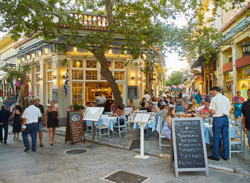 Take a stroll through the vibrant cafe-filled streets of Plaka and the narrow alleyways below the great rock in Anafiotika