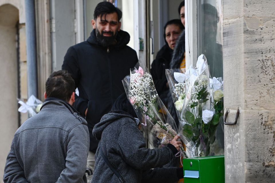 Well wishers brought flowers to the property