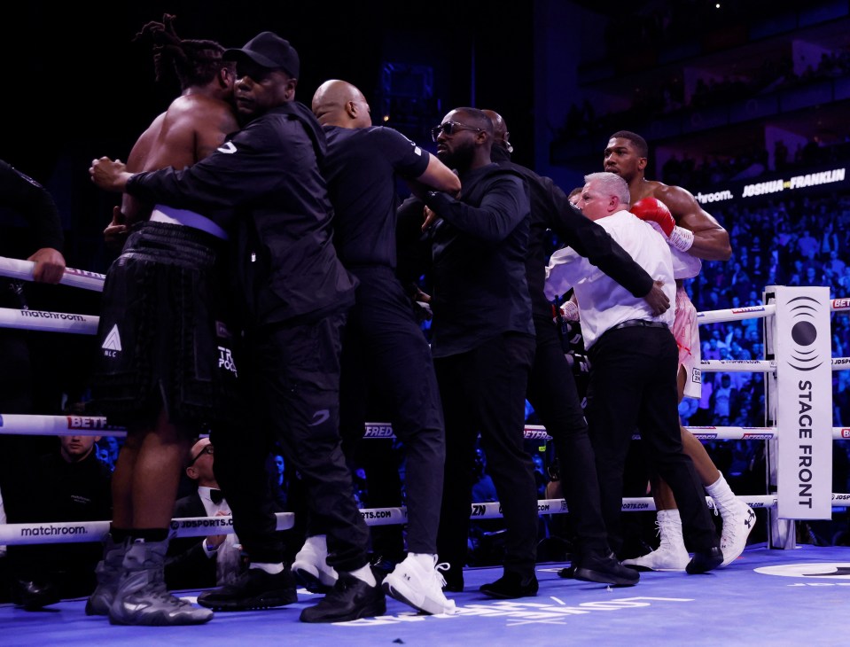 Both men had to be held back from trading blows after the bell