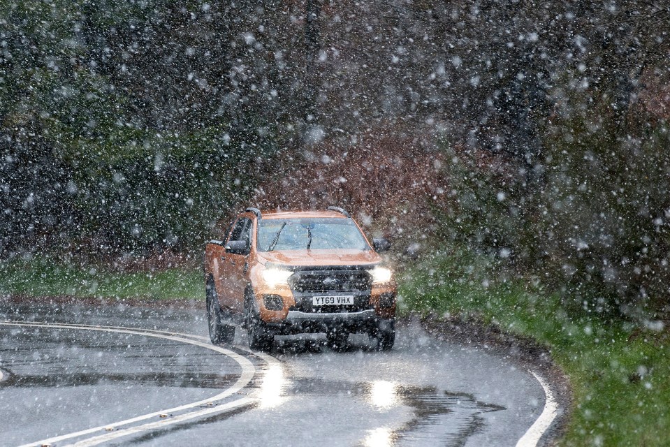 However, wintry showers, as seen here in Powys, Wales on April 12, are possible this week before the weather warms up