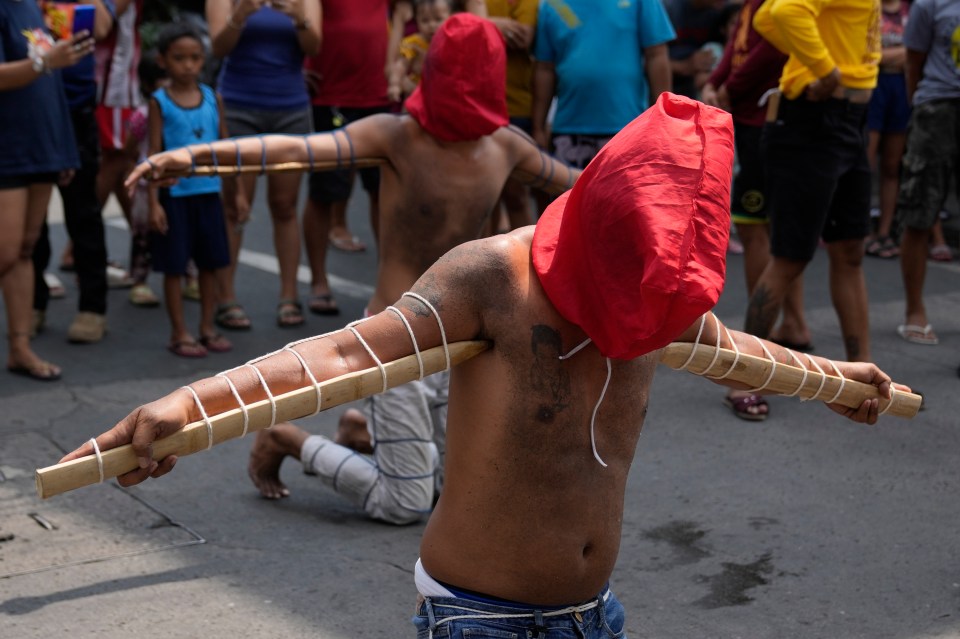 Some had bamboo sticks tied to their arms