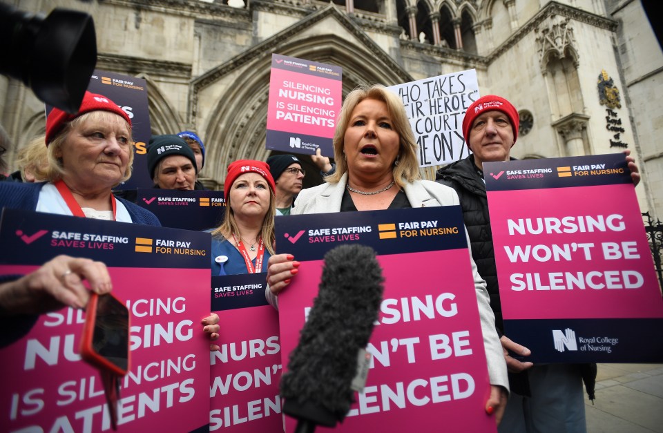 Royal College of Nursing boss Pat Cullen (centre) protests with other union member outside the Royal Courts of Justice ahead of the court’s decision on whether to cut this weekend’s strike shot