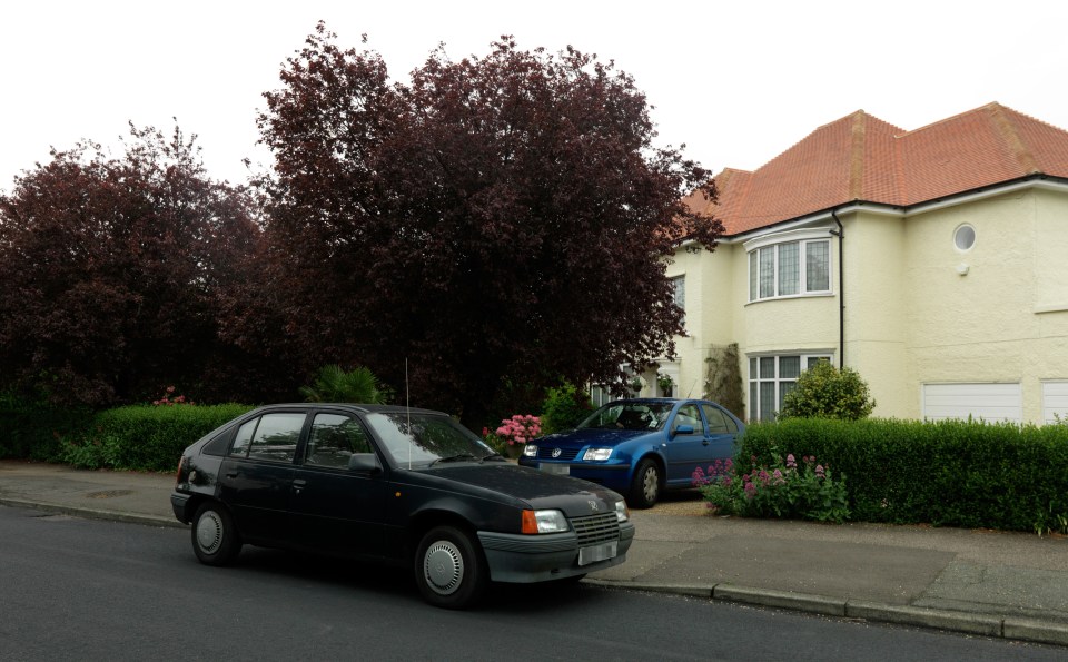 Neighbour has started parking on elderly couple's drive and blocking them in (stock photo)