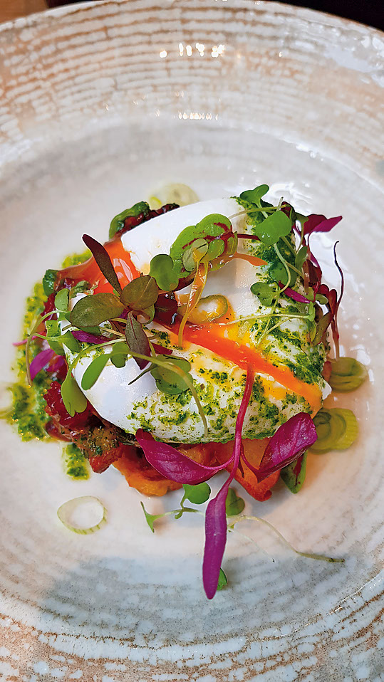 Tuck into courgette fritters with halloumi, poached egg and chilli jam for £11 at No1 Cotswolds