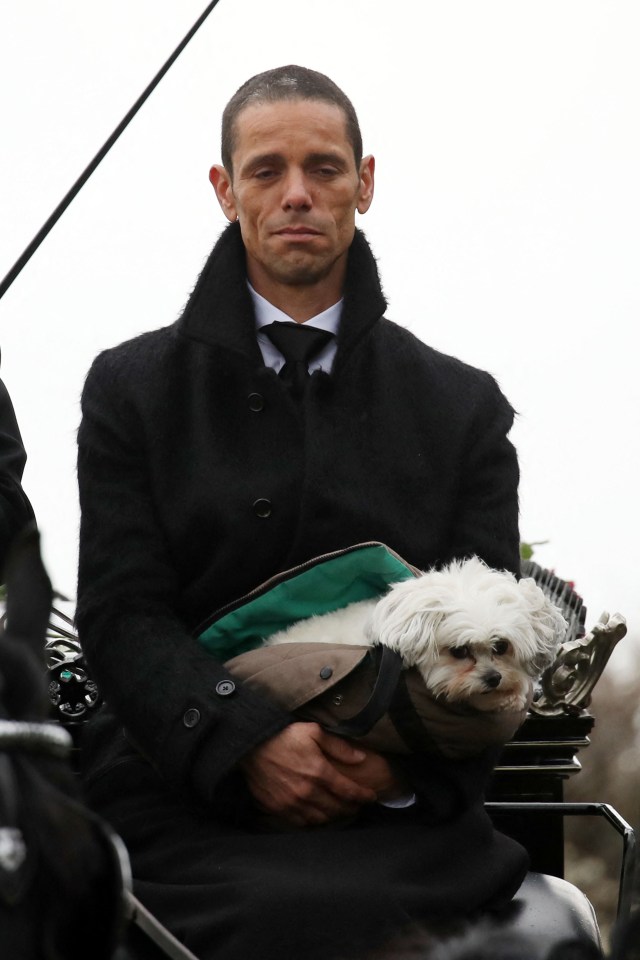 It was heartbreaking to see the late Paul O'Grady's beloved Maltese, Conchita, being cradled by his husband at the star's funeral