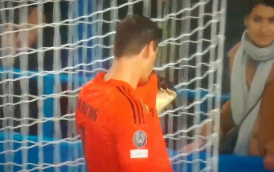 And then hit back at Chelsea fan boos by kissing the Real Madrid badge