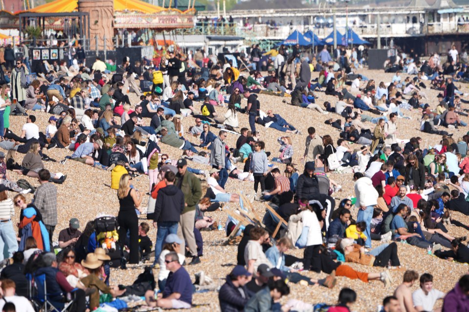 Crowds flocked to Brighton beach to soak up the rays