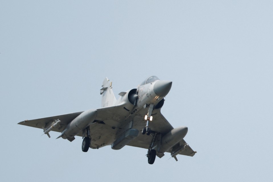 A Taiwanese jet landing after patrolling near the Chinese drills