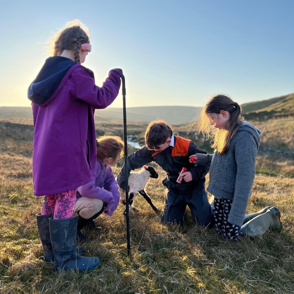 Her children were helping out during lambing season