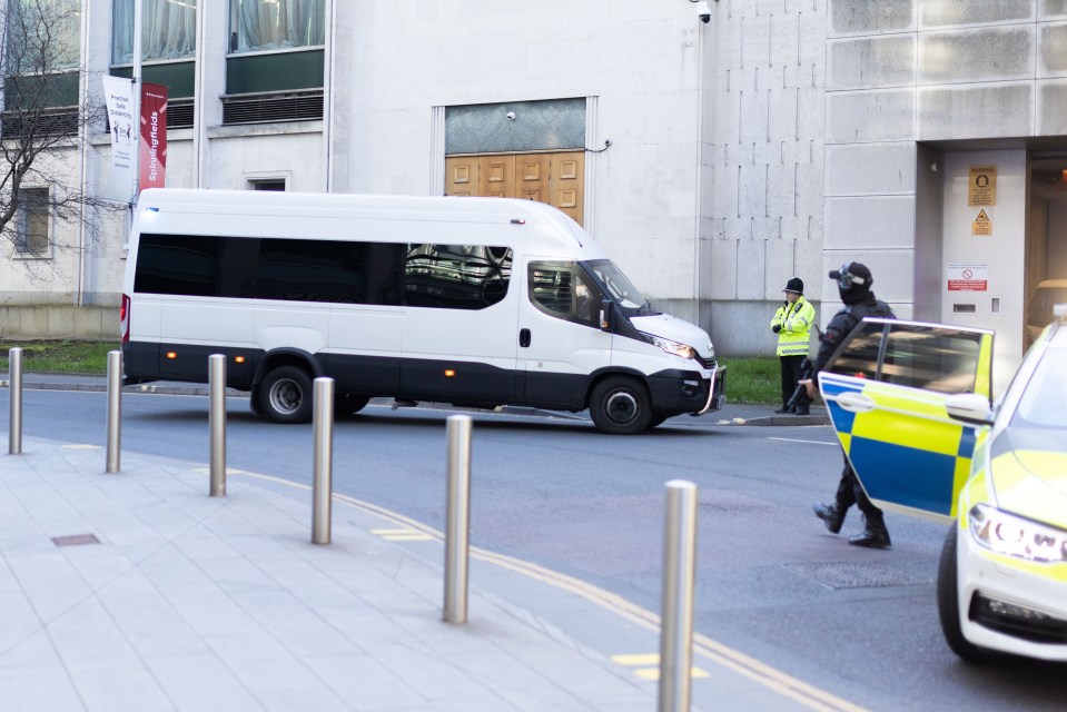 An armed convoy believed to be transporting Cashman to court