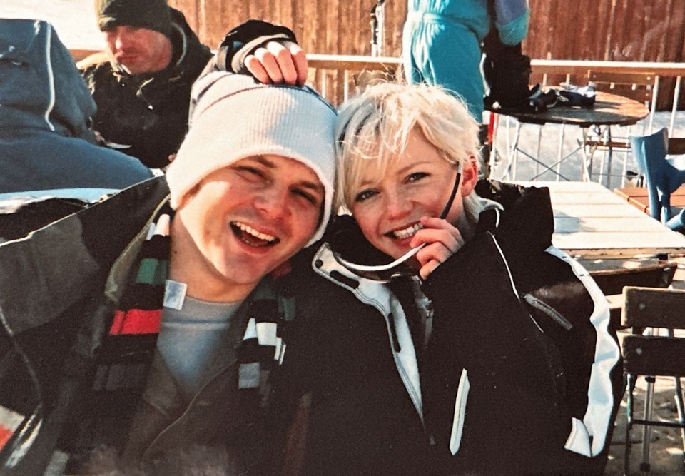 Paul in a woolly hat smiles with Hannah on a winter getaway