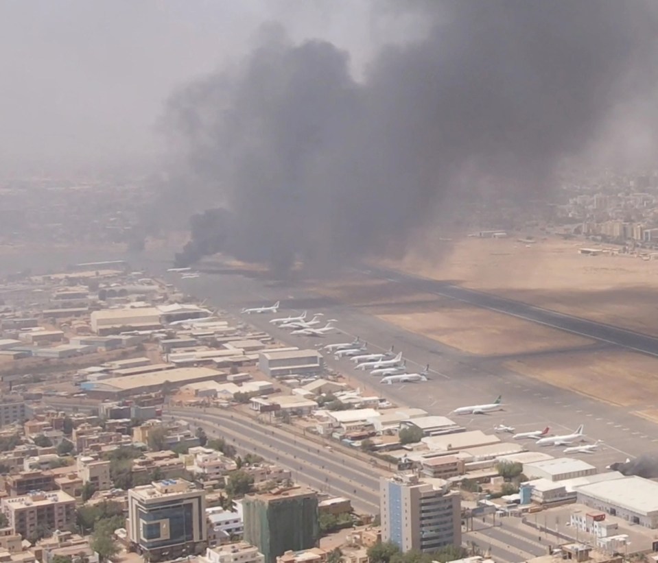 Smoke rises over the city as army and paramilitaries clash in power struggle in Khartoum