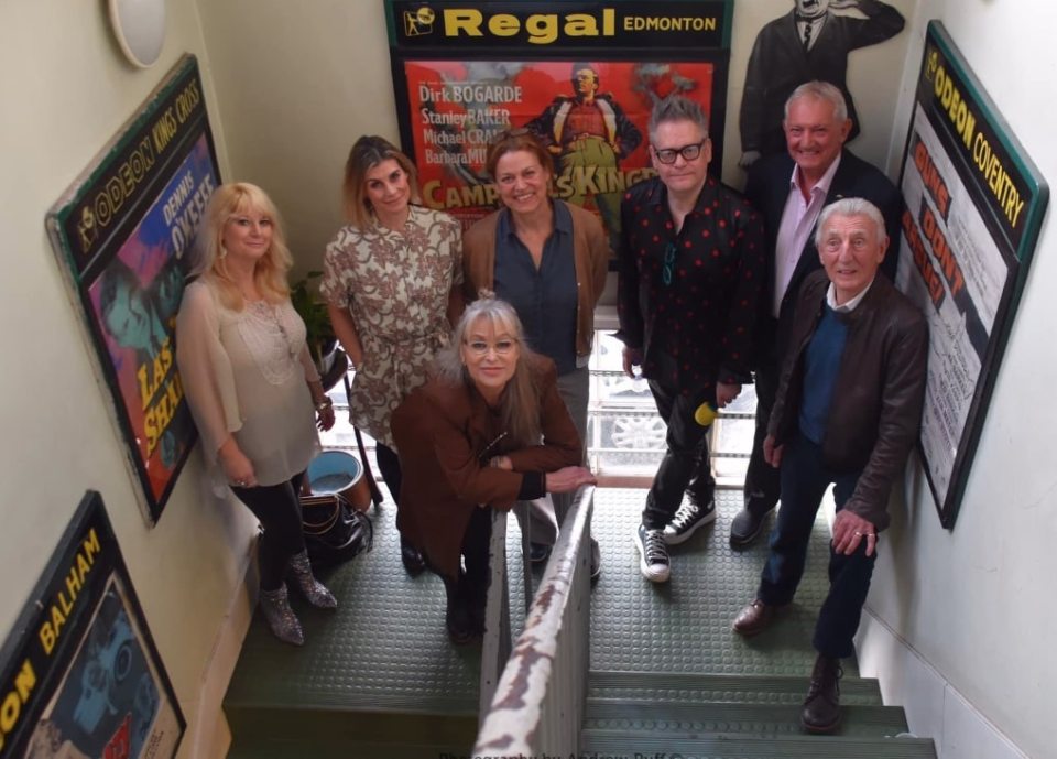 Kim Tiddy (second left), Carol Royle (front), Andrea Mason (middle), Graham Cole (second right) and Eric Richard (first right) pose with event organisers Stuart Morriss (third right) and Jenn Morriss (far left)