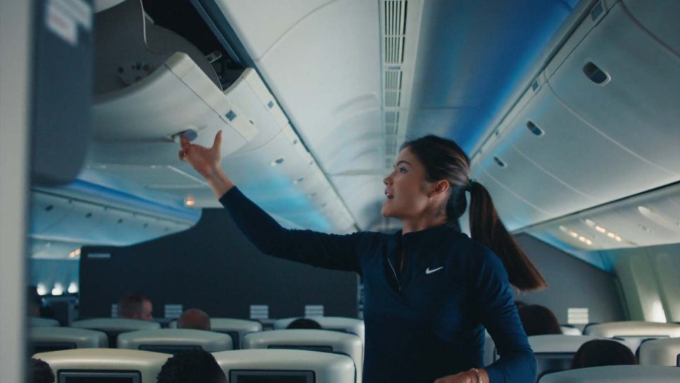 Tennis ace Emma Raducanu features on board a plane in the new safety video