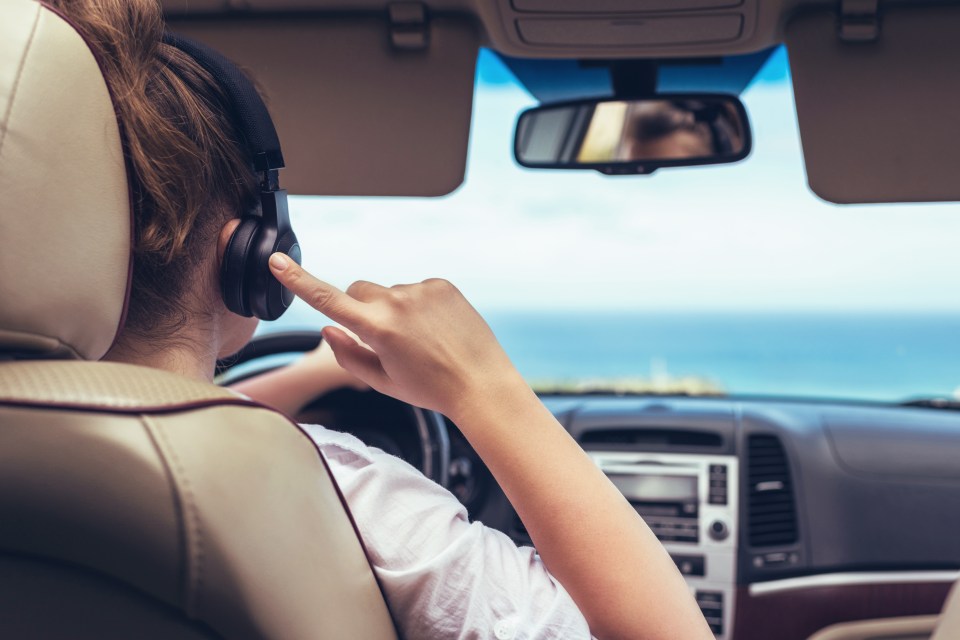 Wearing headphones while driving means you're potentially not as aware of what's going on around you as you should be