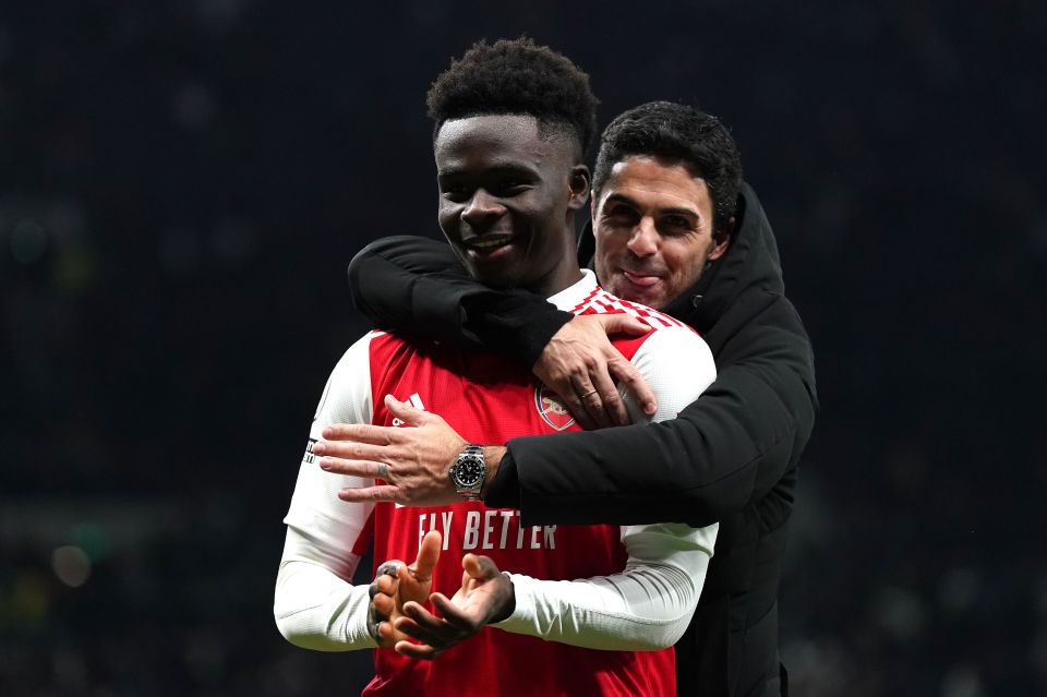 Bukayo Saka with Arsenal manager Mikel Arteta