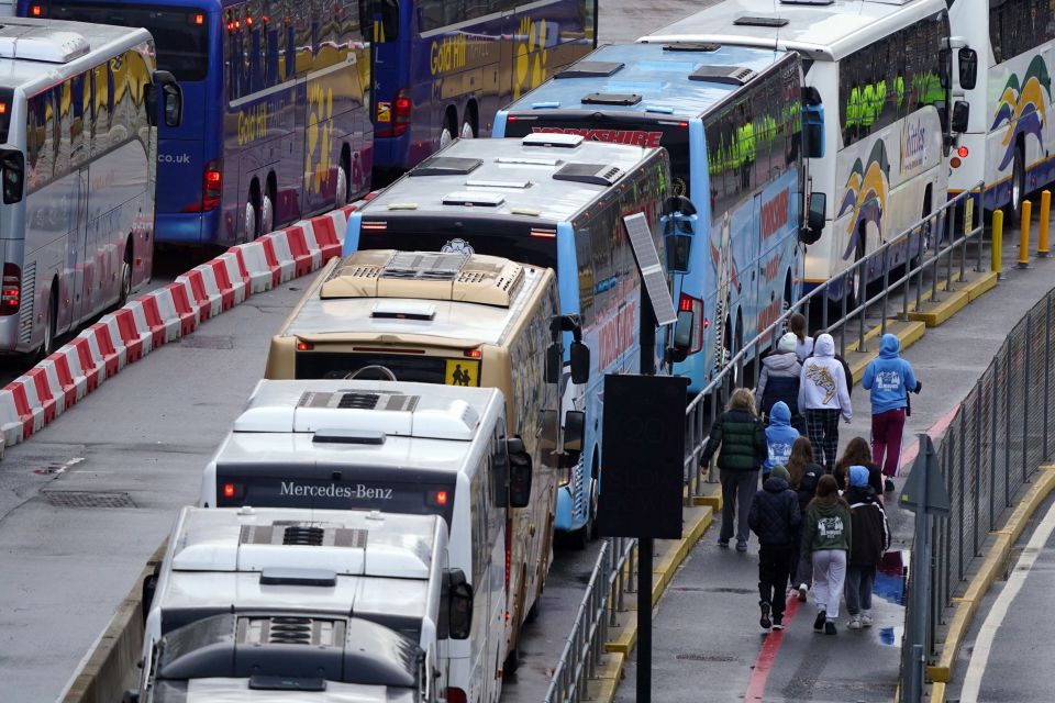 Kids were stuck in the queues for more than 12 hours - with this photo taken on Saturday showing one group still waiting