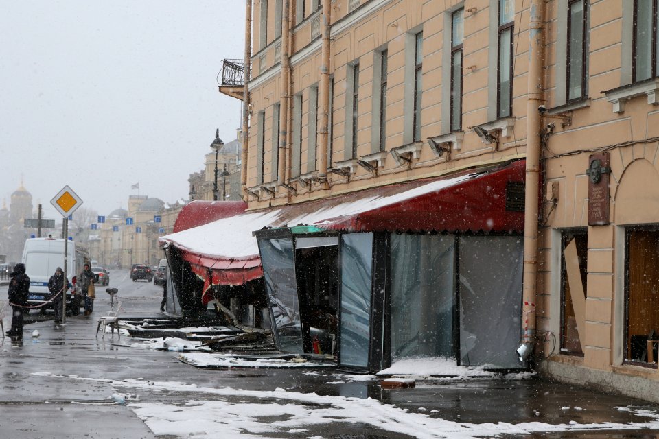 The bomb ripped through the St Petersburg cafe where he was speaking