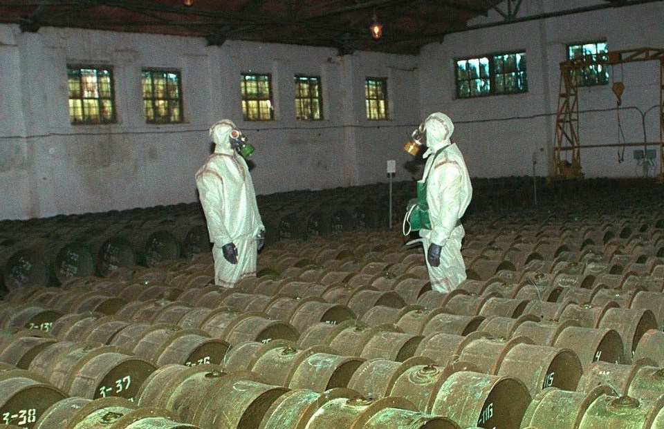 Two Russian soldiers at a chemical weapons storage site in the town of Gorny in Russia