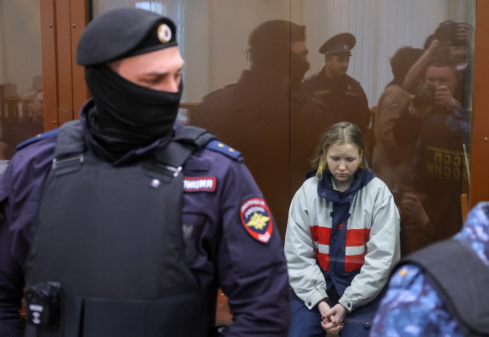 Daria Trepova was locked in a glass cage as she appeared in court