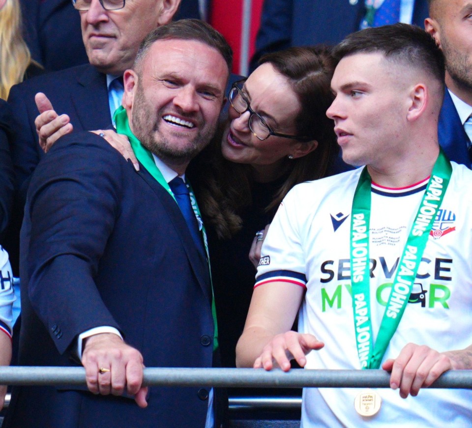 Sharon Brittan congratulates Bolton boss Ian Evatt at Wembley