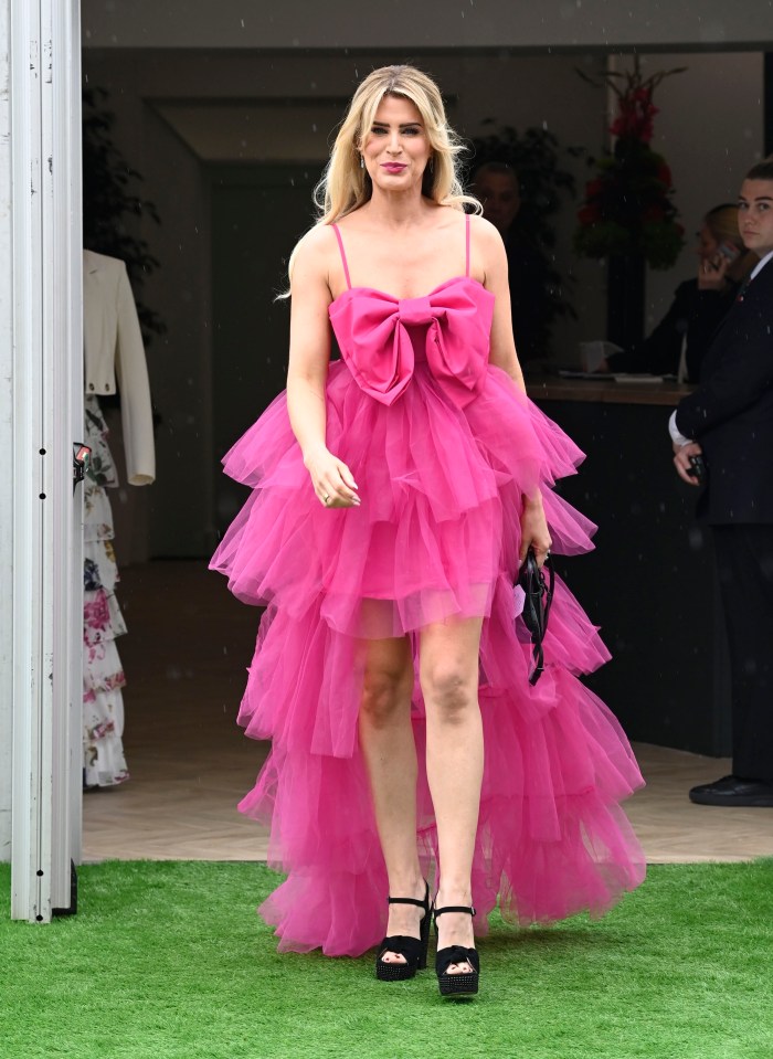 Ex-Hollyoaks character Sarah Jayne Dunn looked pretty in pink, donning a frilly tiered dress with a large bow on the front