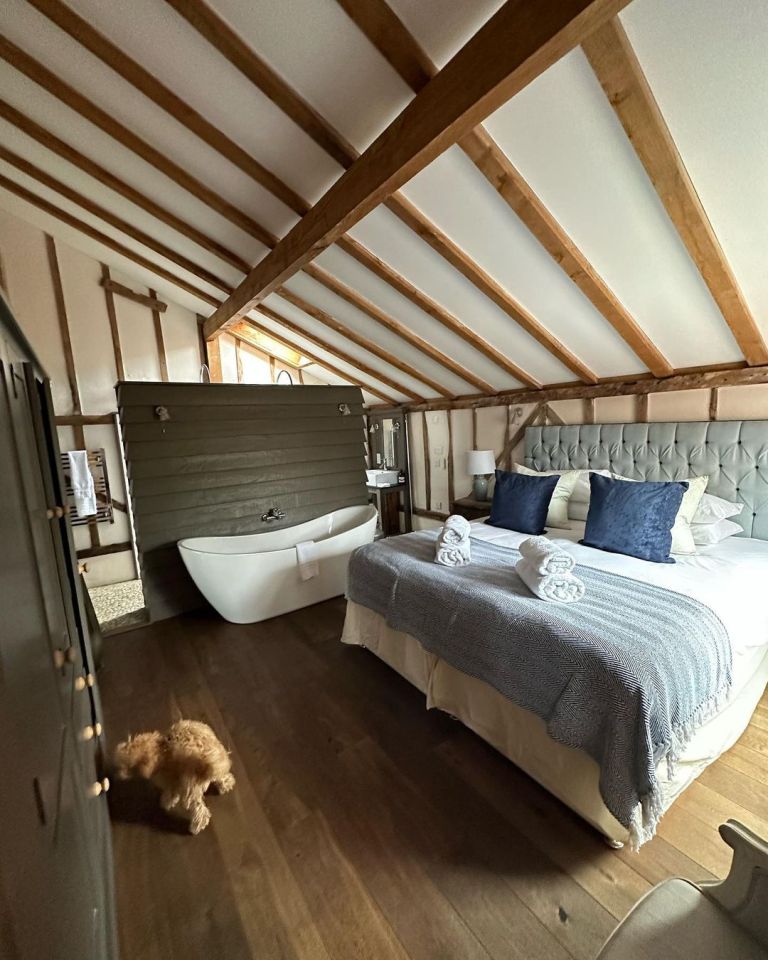 Their rustic room boasted a huge bed and sunken tub