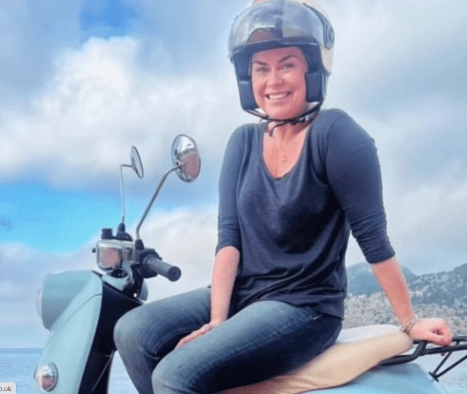 The 50-year-old travel enthusiast looked incredible as she displayed her slim form while riding a scooter and sporting some tight blue pants