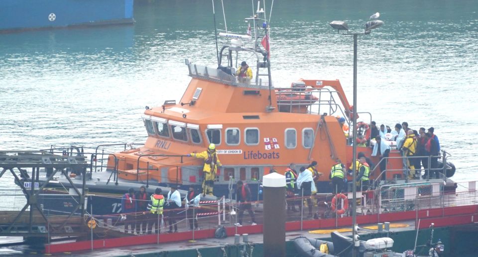 Migrants are brought into Dover by the RNLI