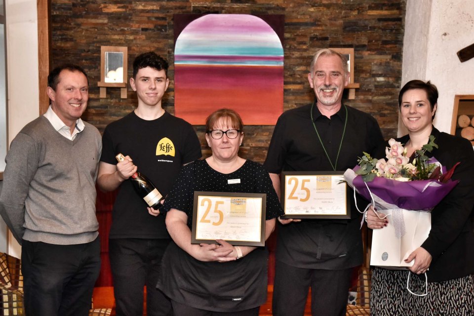 Martin and Alison Drury celebrate 25 years of dedication to Wetherspoons with son, Robert